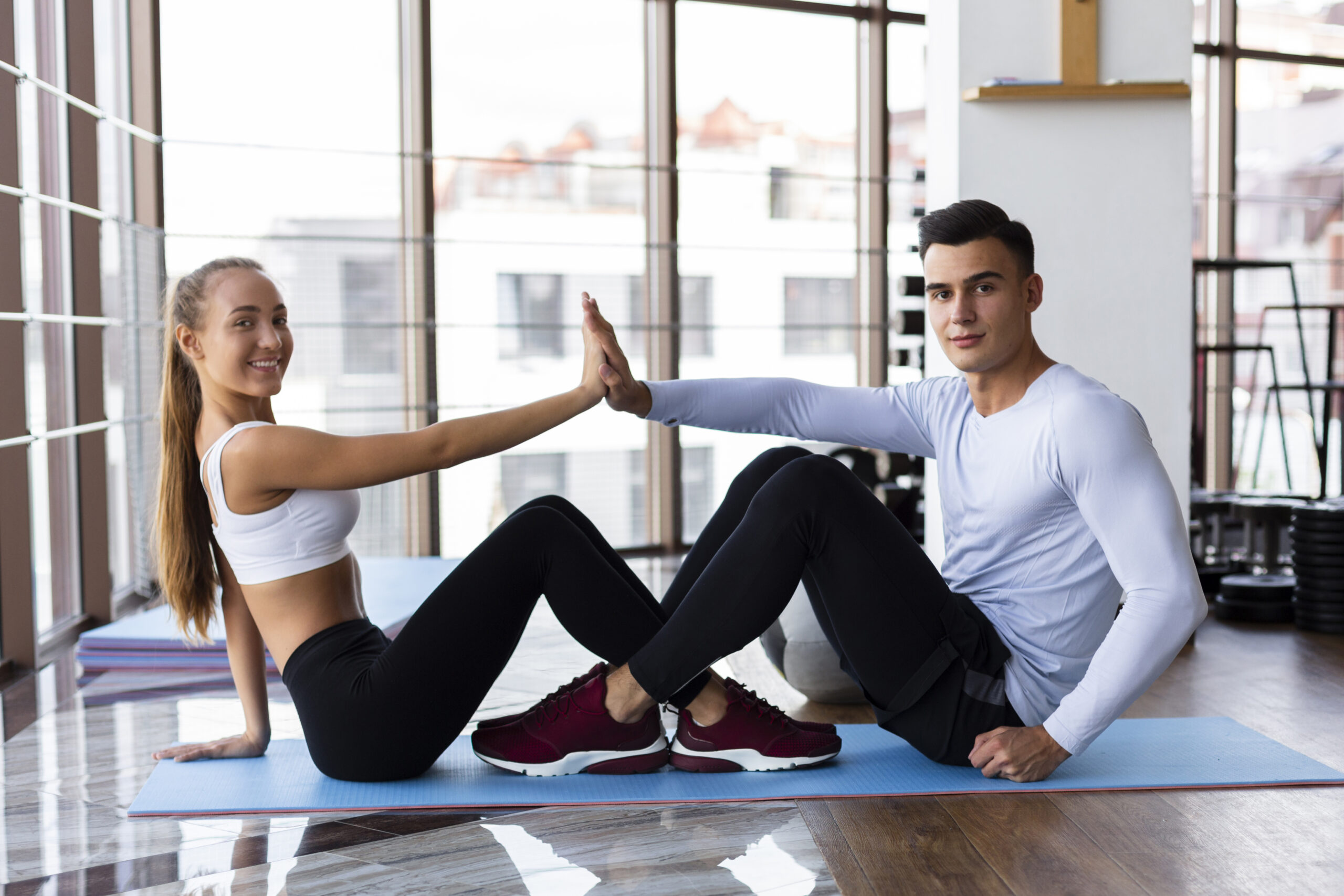 side-view-man-woman-gym